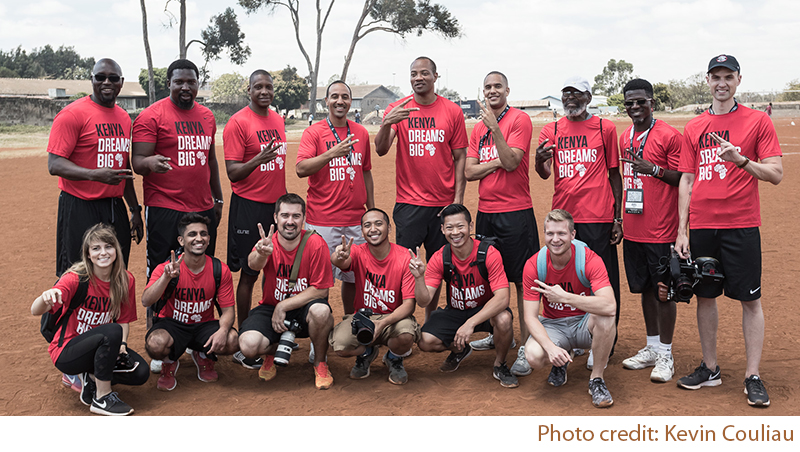 Giants of Africa organization members wearing red custom printed t-shirts including Masai Ujiri, Toronto Raptors president.