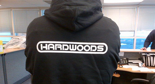 Client's customized sweatshirt with company logo. Embroidered hooded sweatshirt with various colours to choose from.