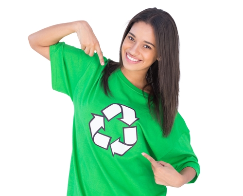 A girl wearing a green recycled tshirt