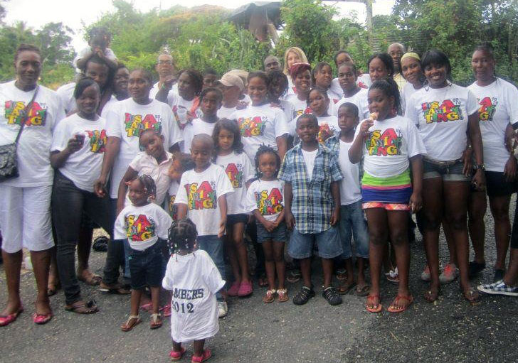 Big group of family members with customized designs on their screen-printed t-shirts.