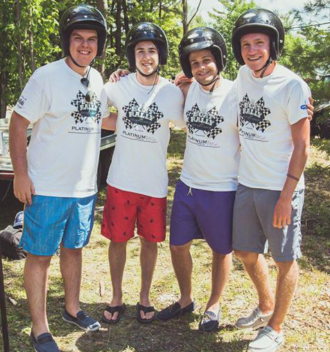 Group of people getting ready for the Boat rally wearing custom printed t-shirts with logo.