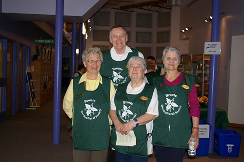 Customized company logos on custom aprons.