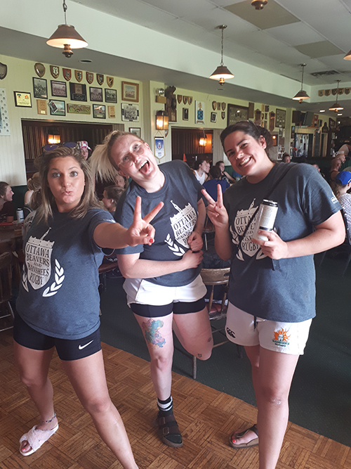 Group of ladies wearing custom t-shirts with a custom design.