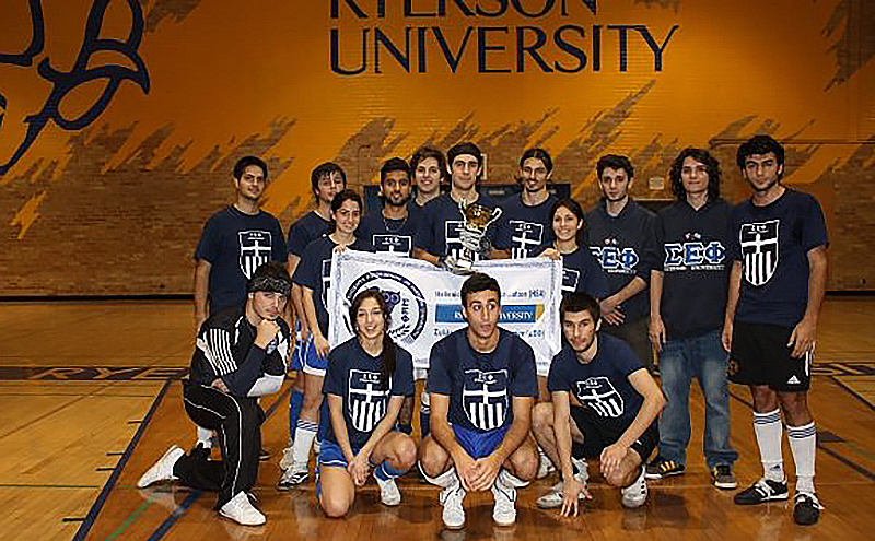 Ryerson University students wearing navy blue custom school t-shirts with their team logo.