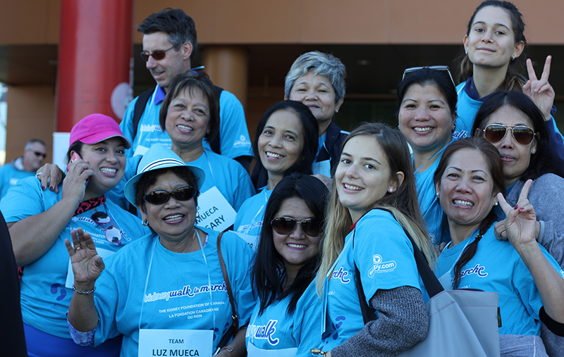 Kidney Walk group of people wearing blue custom t-shirts for charitable fundraiser.