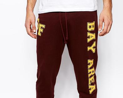 Custom sweatpants with personalization lettering for school uniforms and teams.